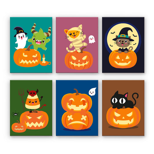 Halloweenske mačky a tekvice